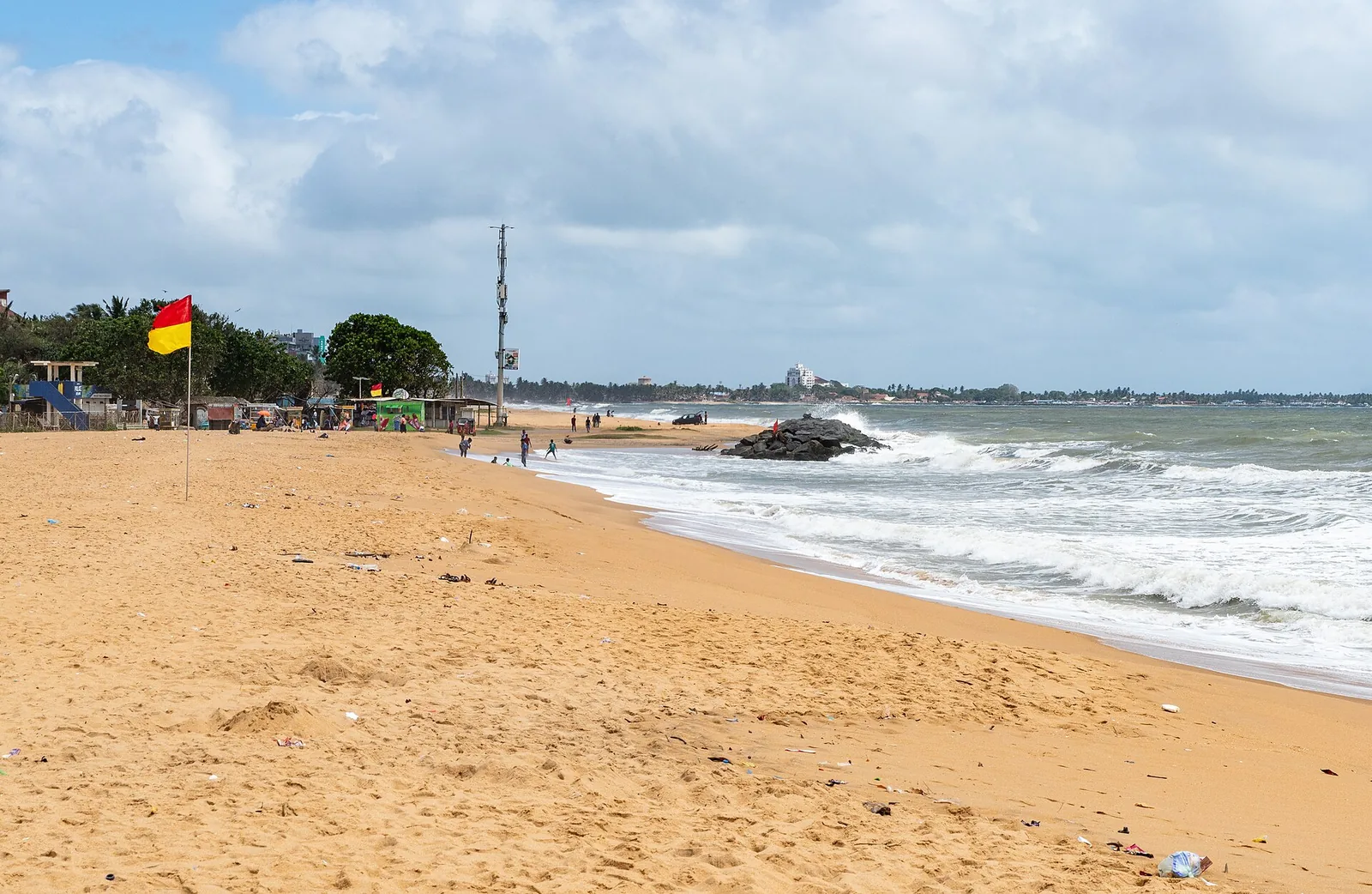 The sandy beach and shoreline at Negombo, Sri Lanka.