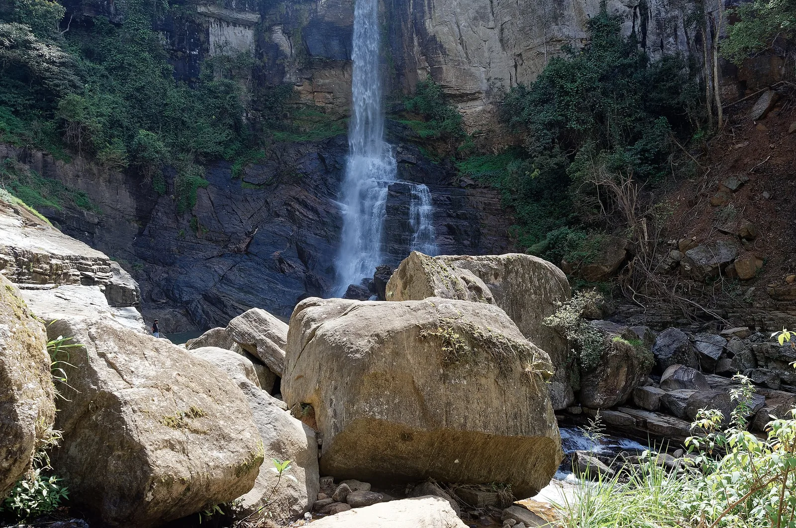 Ramboda Falls cascading down a rocky cliff in Sri Lanka's Central Province.